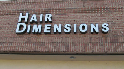 Hair Dimensions salon - a
                                      photo showing the front facade